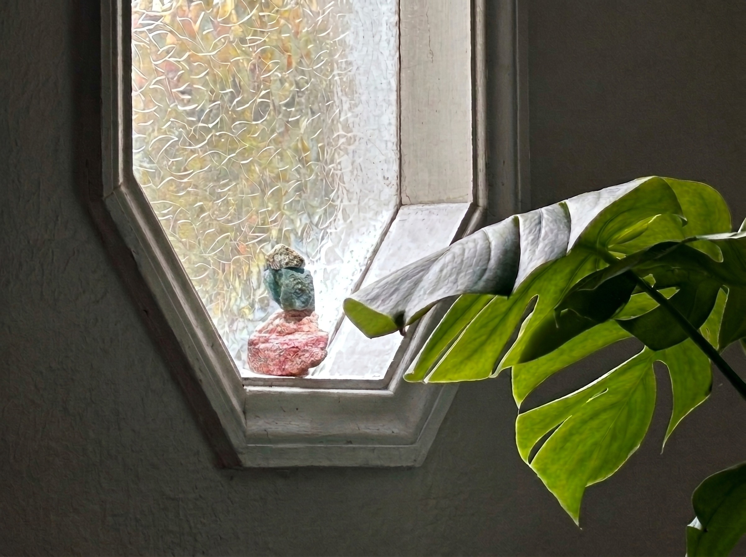 Custom Stack — rose quartz, amazonite, and Dalmatian jasper composition in a window at Annie's house